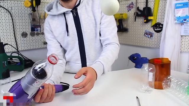 切開塑料瓶插在吹風筒上，乒乓球竟出現有趣的現象