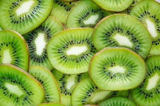 Close-Up Photography of Sliced Kiwi Fruits